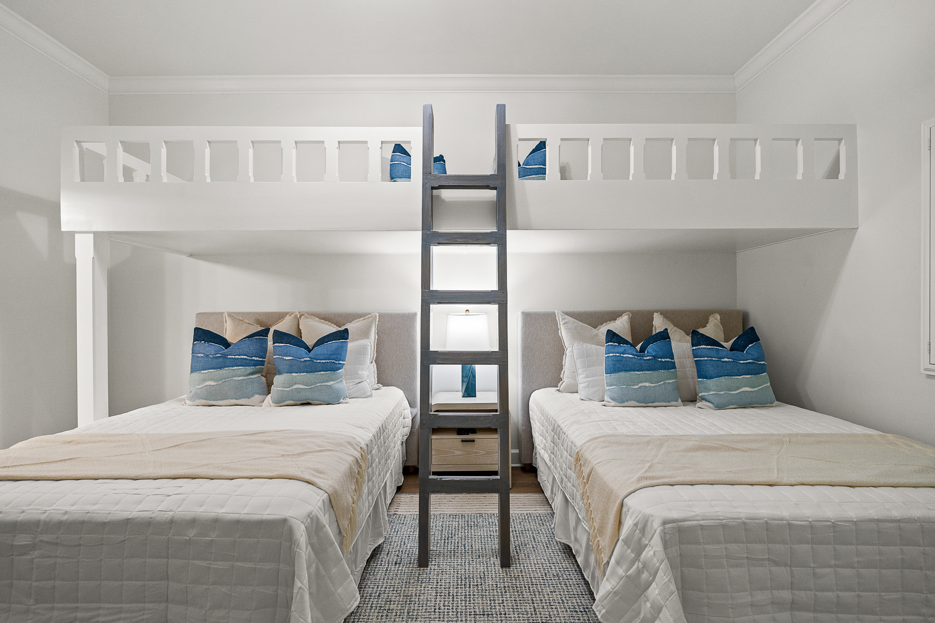Decorative bedding replaced with fresh sheets.