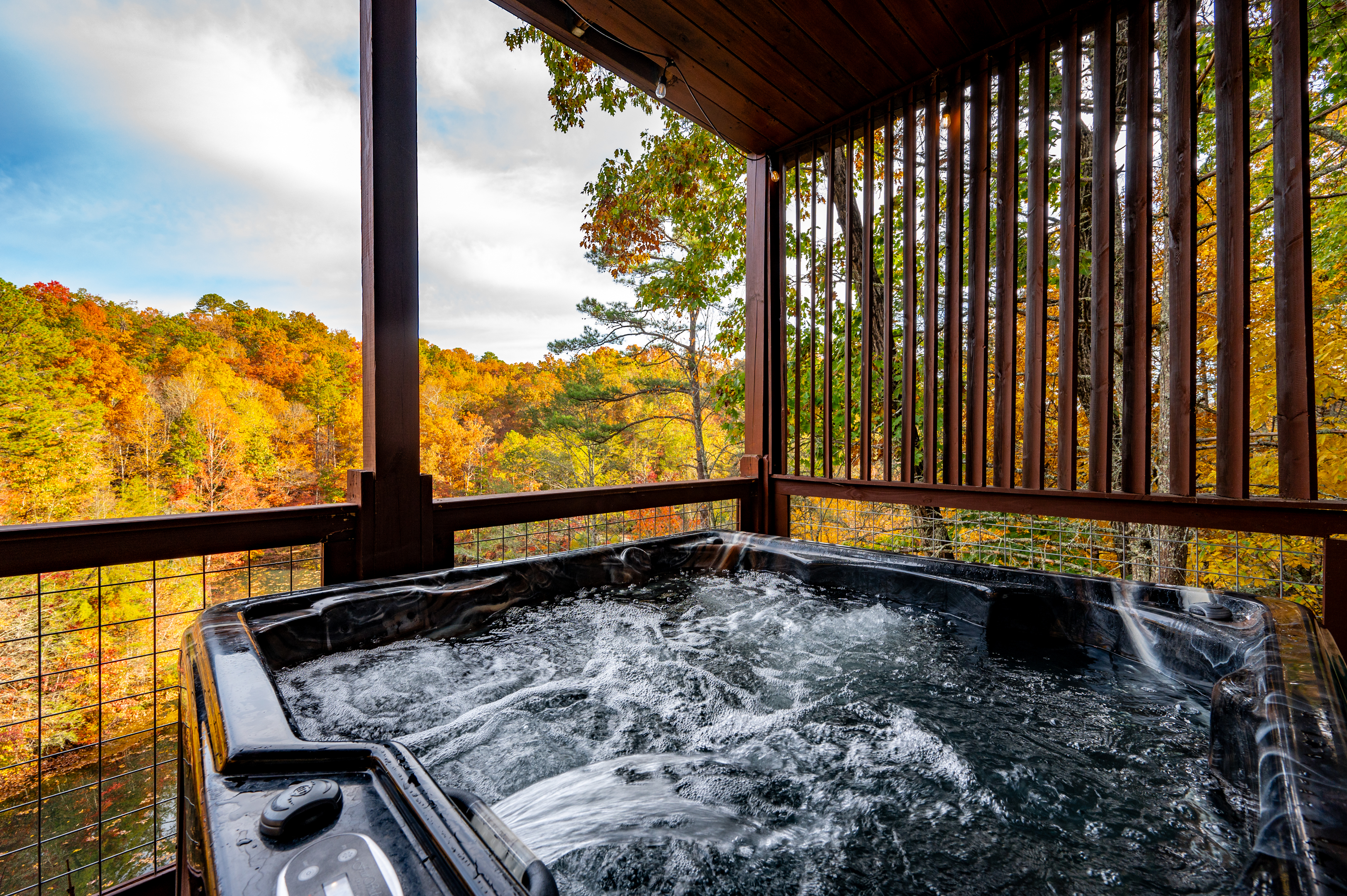 Live Your Best Life Perched Above it all While Soaking in the Views From Your Oversized Hot Tub