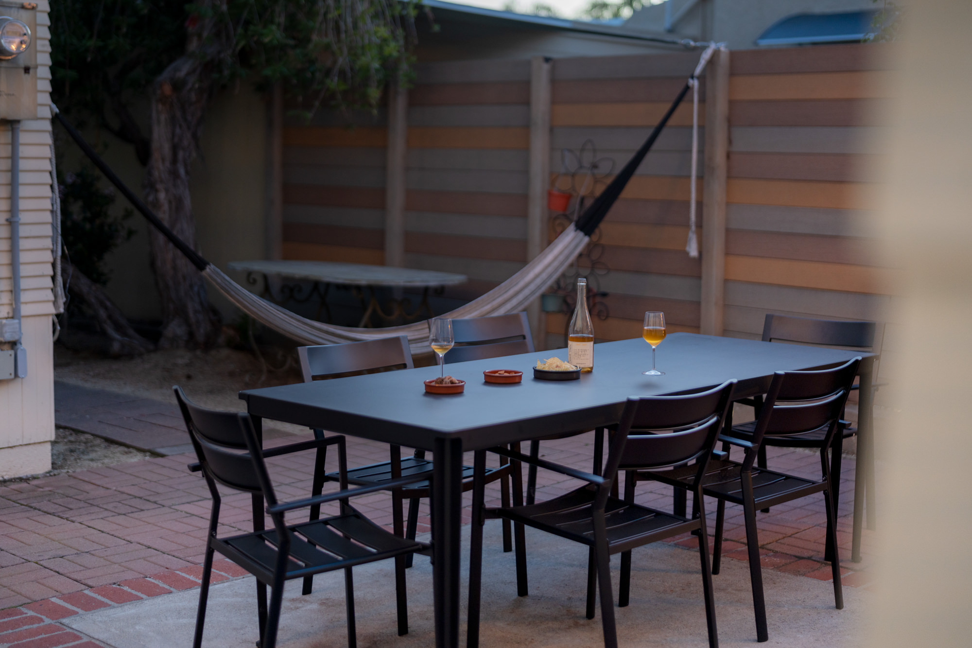 Relax in the backyard hammock or dine on the patio.