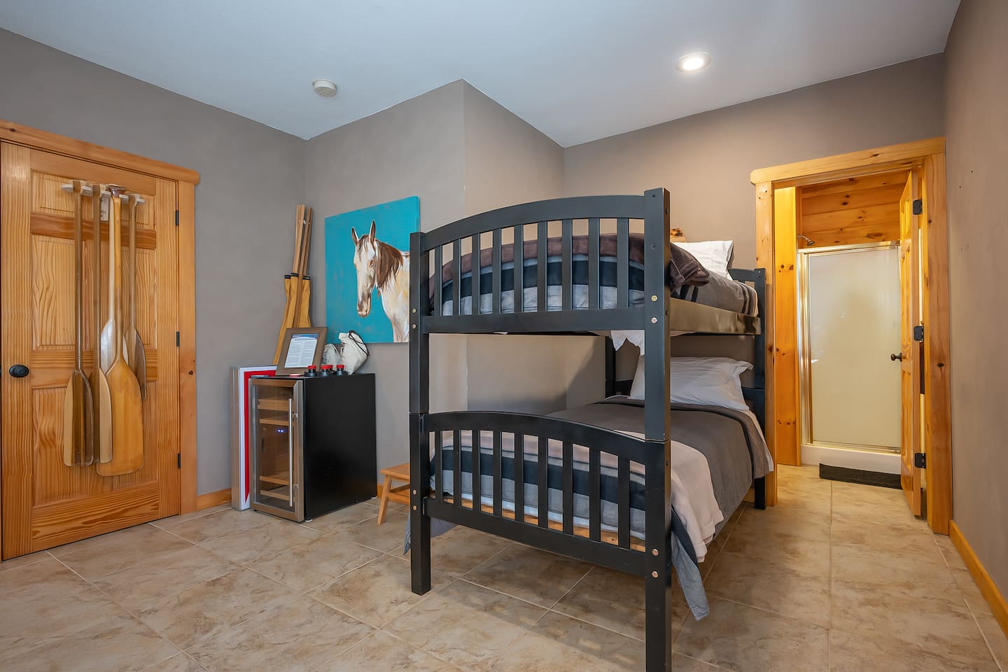 Bunk room located on lower level of home