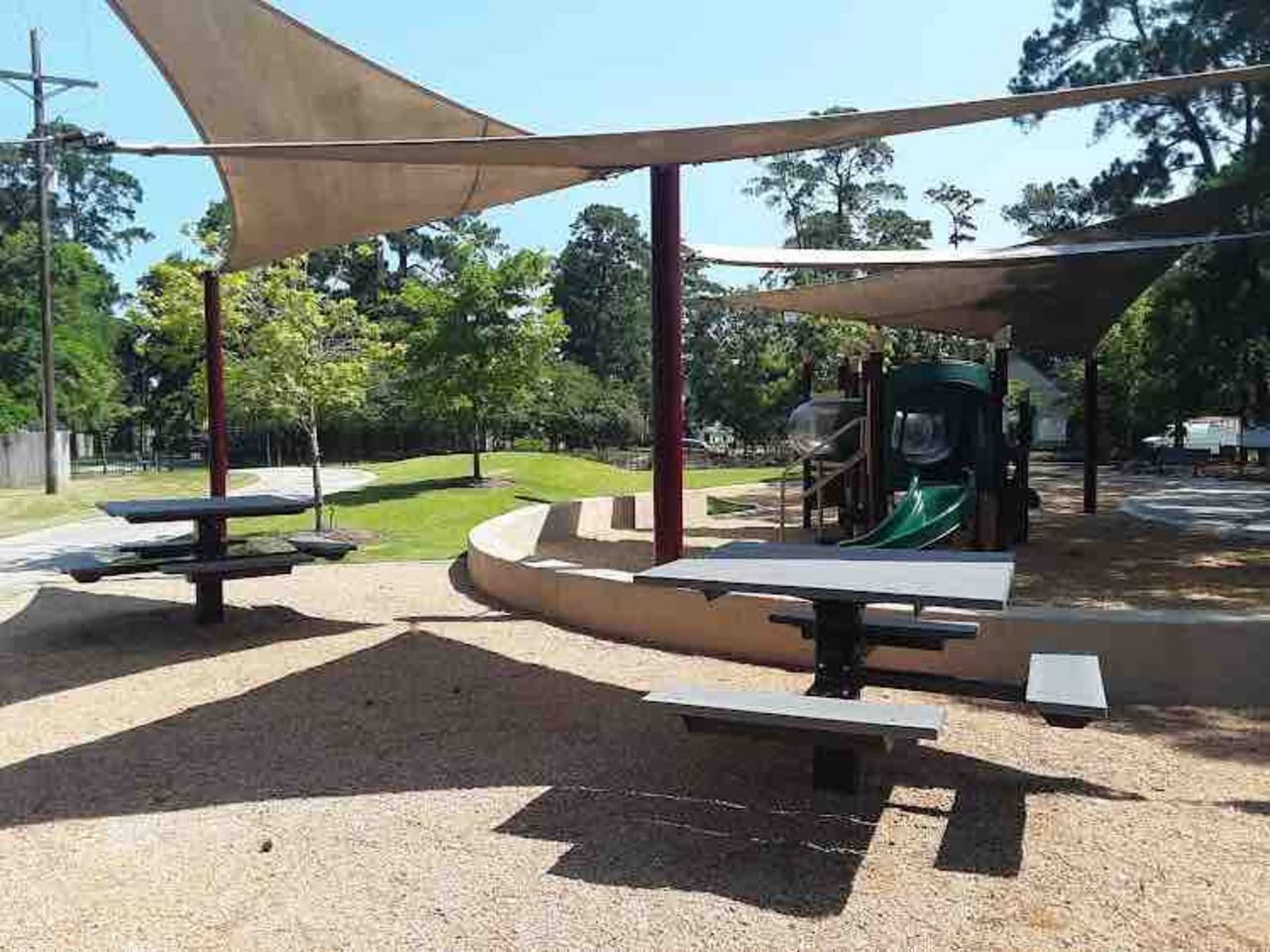 Toddler park with picnic tables 