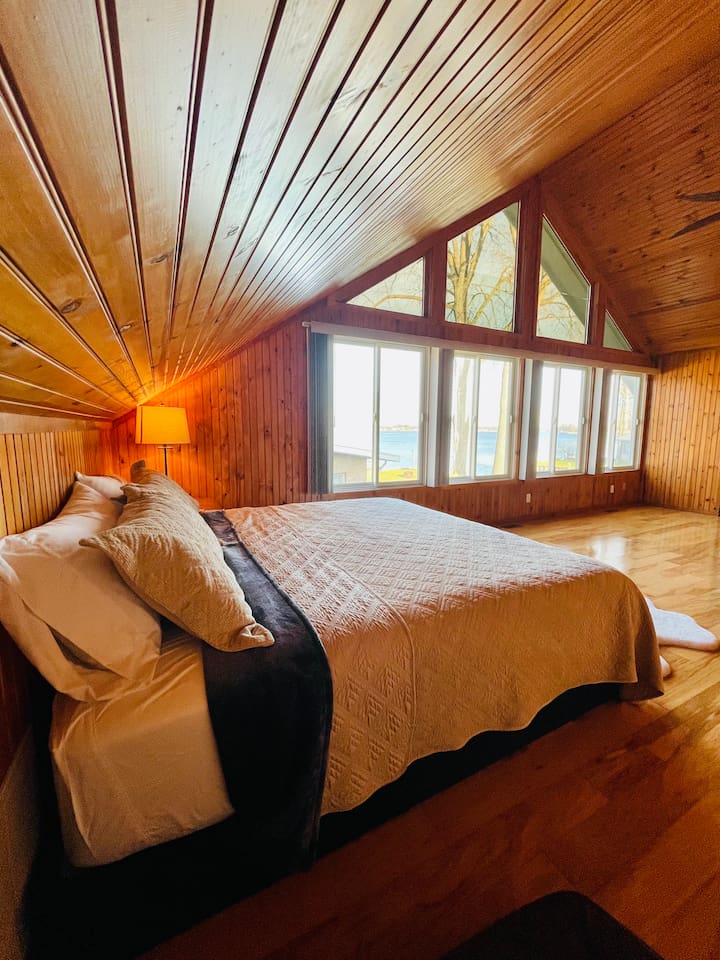Warm wood ceiling and architectural cabin detail.