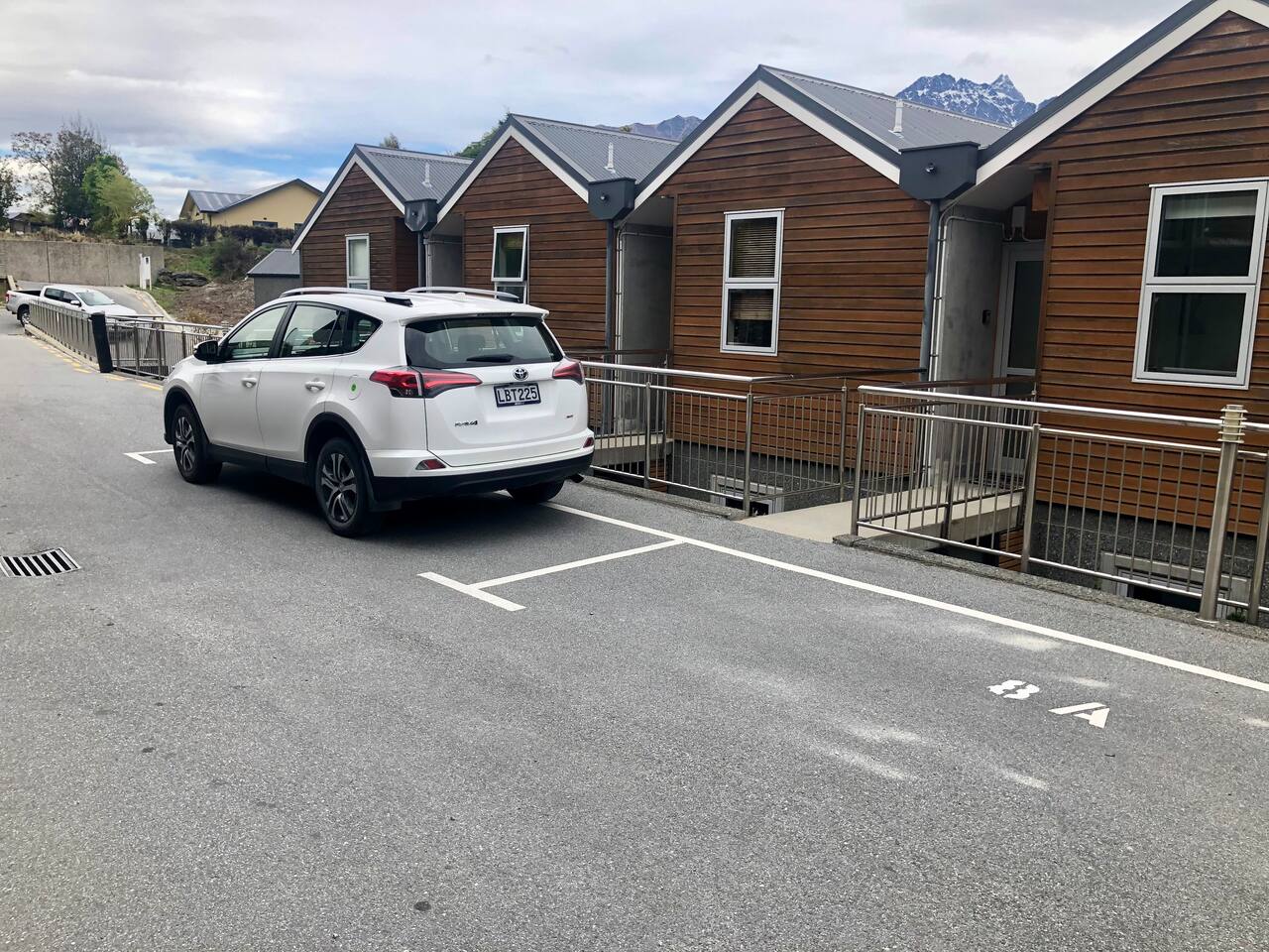 Assigned carpark space outside apartment (where Toyota is parked). 
