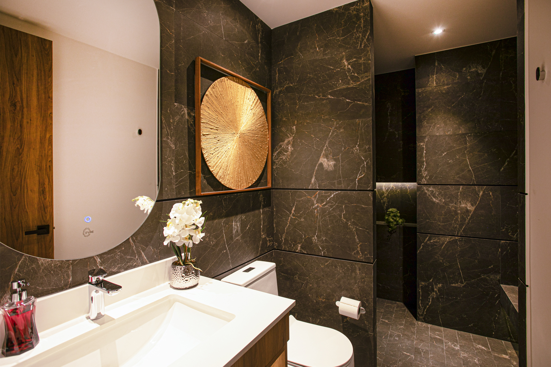 The secondary full bathroom offers a sleek walk-in shower and modern finishes—perfect for guests or extra convenience.