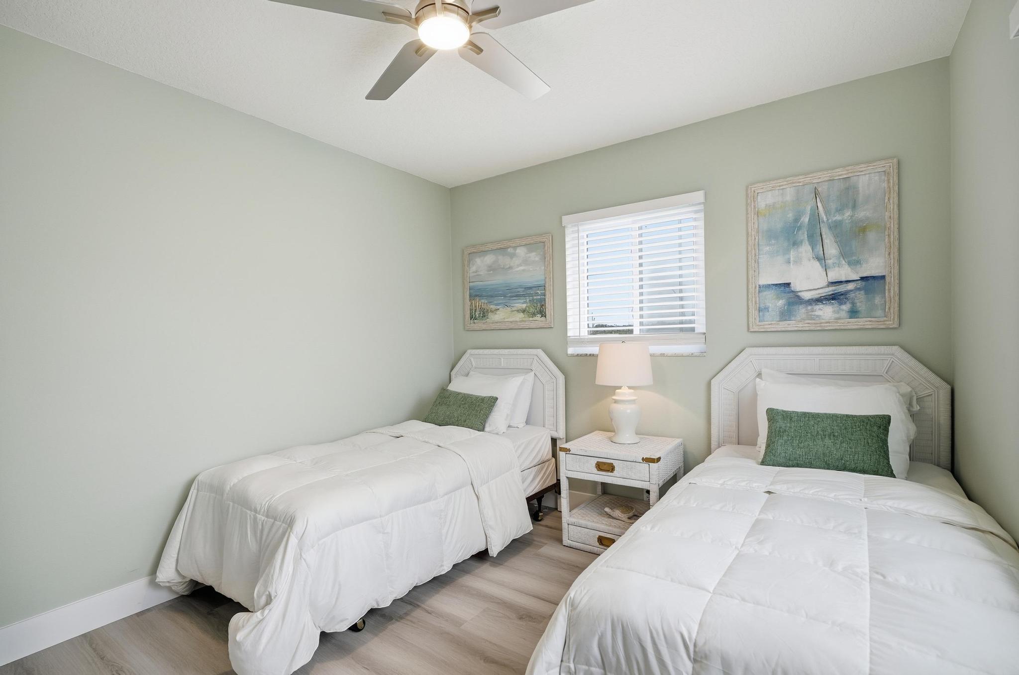  Bedroom 2 -2 Twin beds, a closet, and a TV 