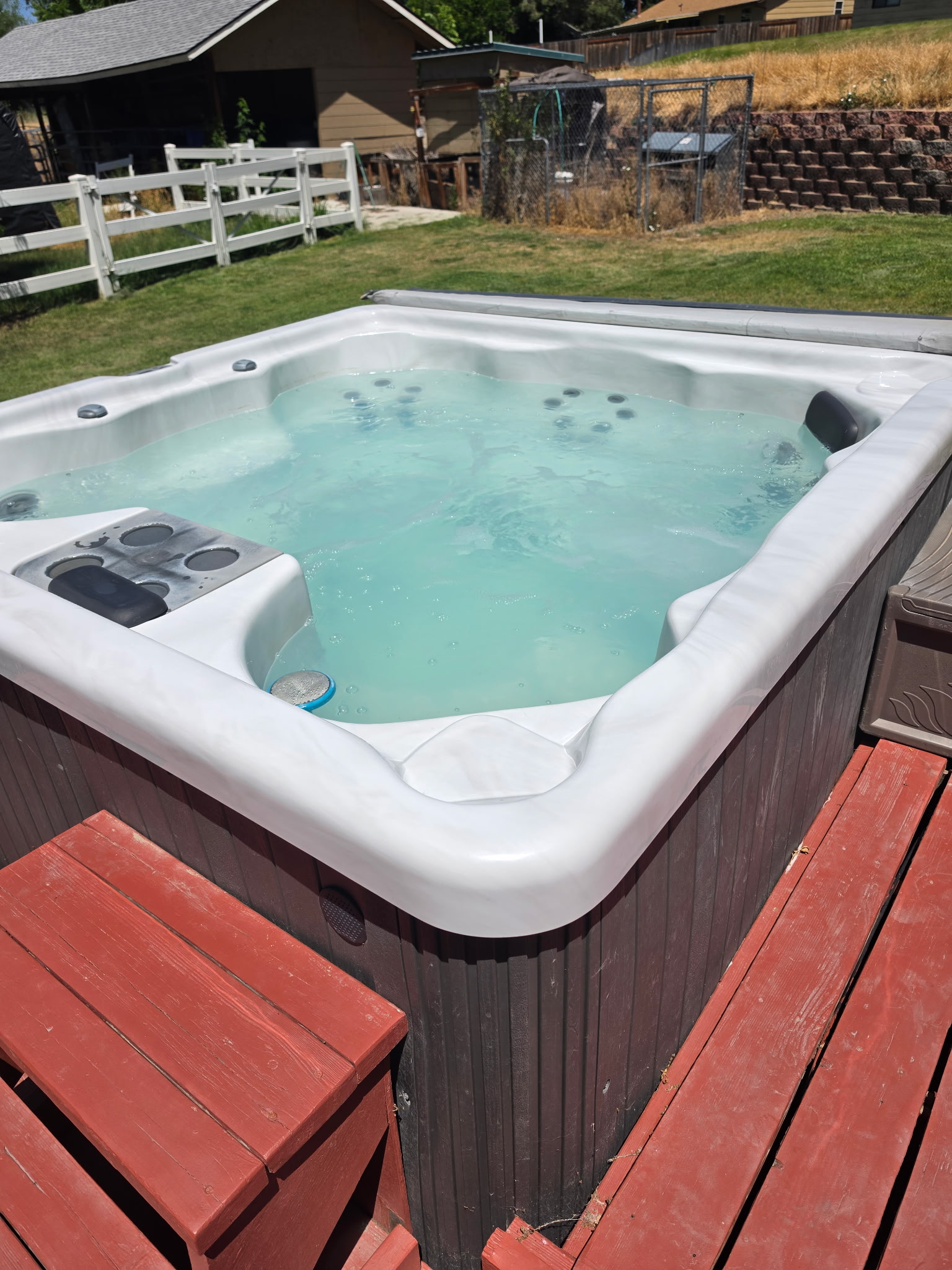 Well-maintained hot tub that comfortably accommodates up to eight adults.