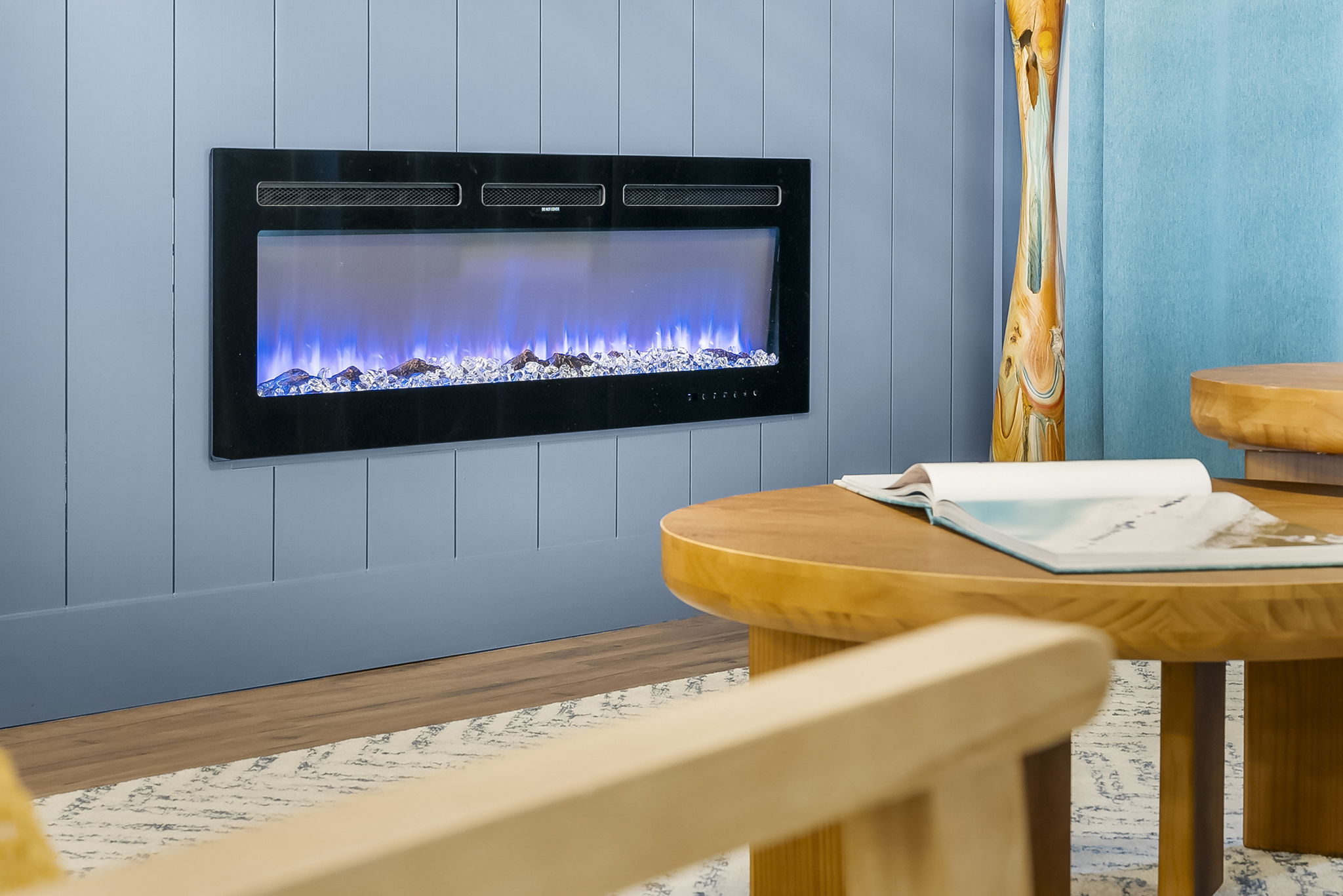 Feelin' relaxed, refreshed, and recharged beachside as you curl up to the fireplace after a long day in the sun (can be operated without heat for ambient flames).