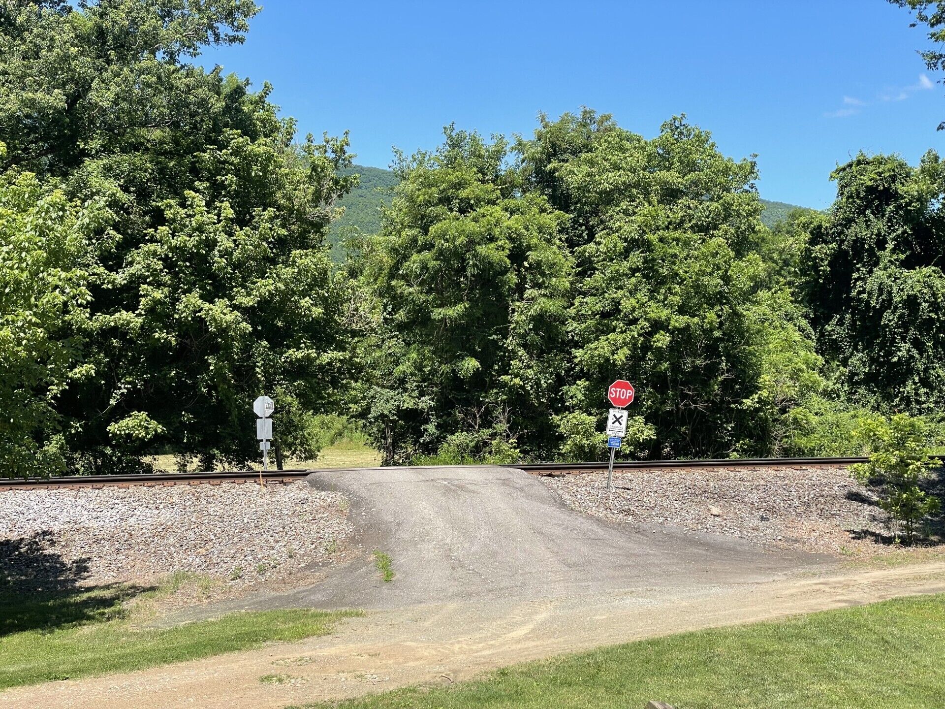 Cross over the railroad tracks here to access the river area