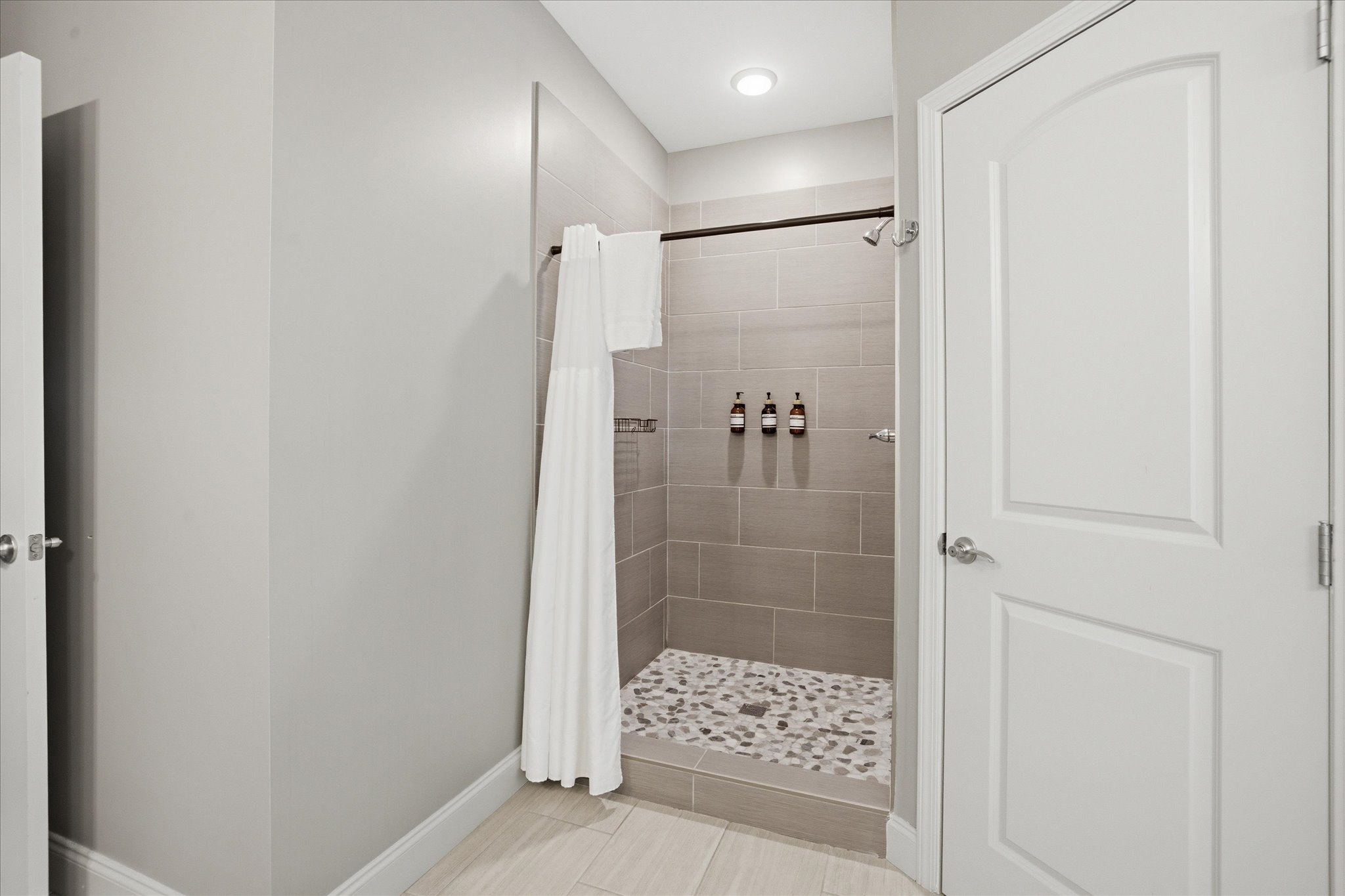 Step into the shower and reset—clean, spacious, and designed to give you a moment to slow down without overcomplicating it.