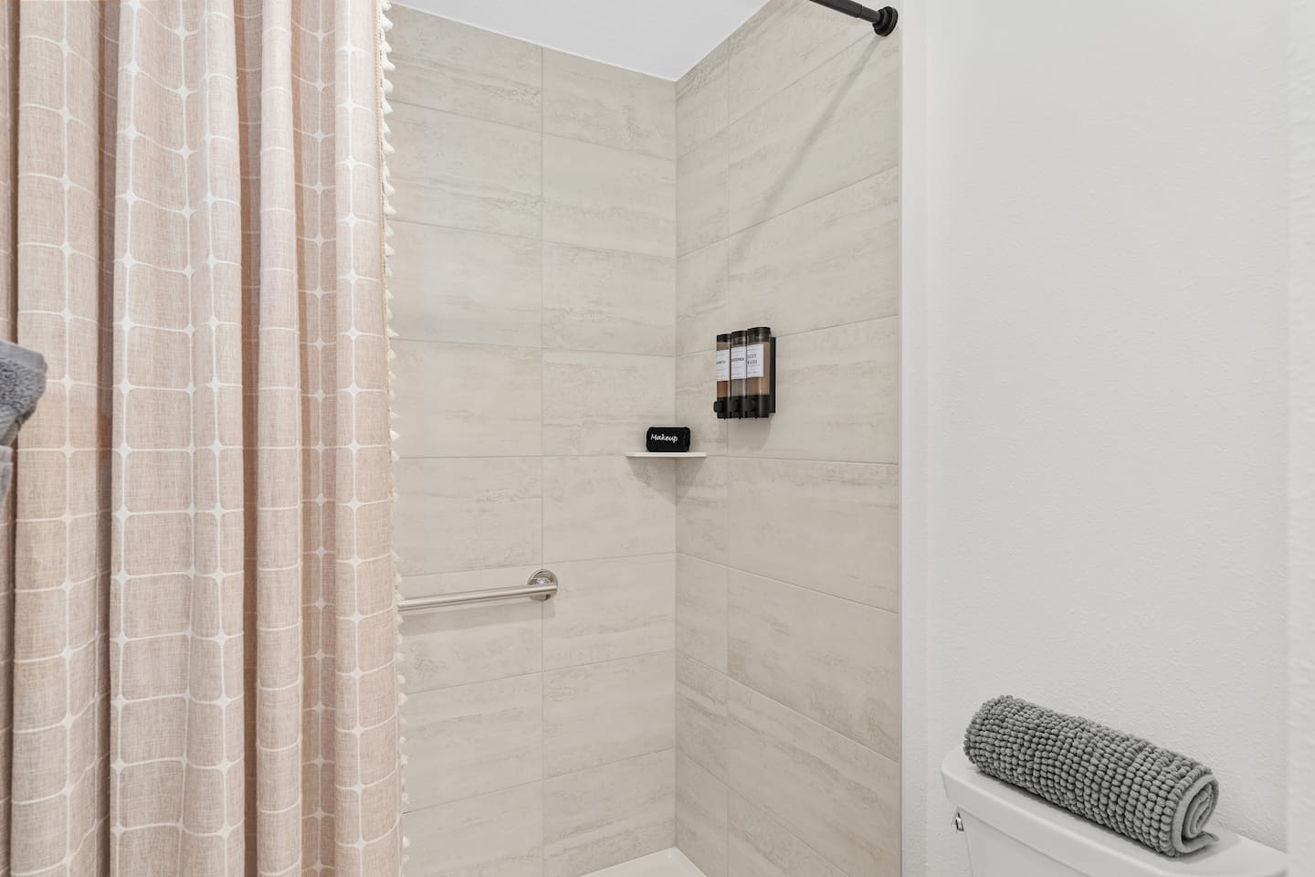 We have provided complimentary shampoo, conditioner and body wash in this master bathroom with spacious walk in shower.