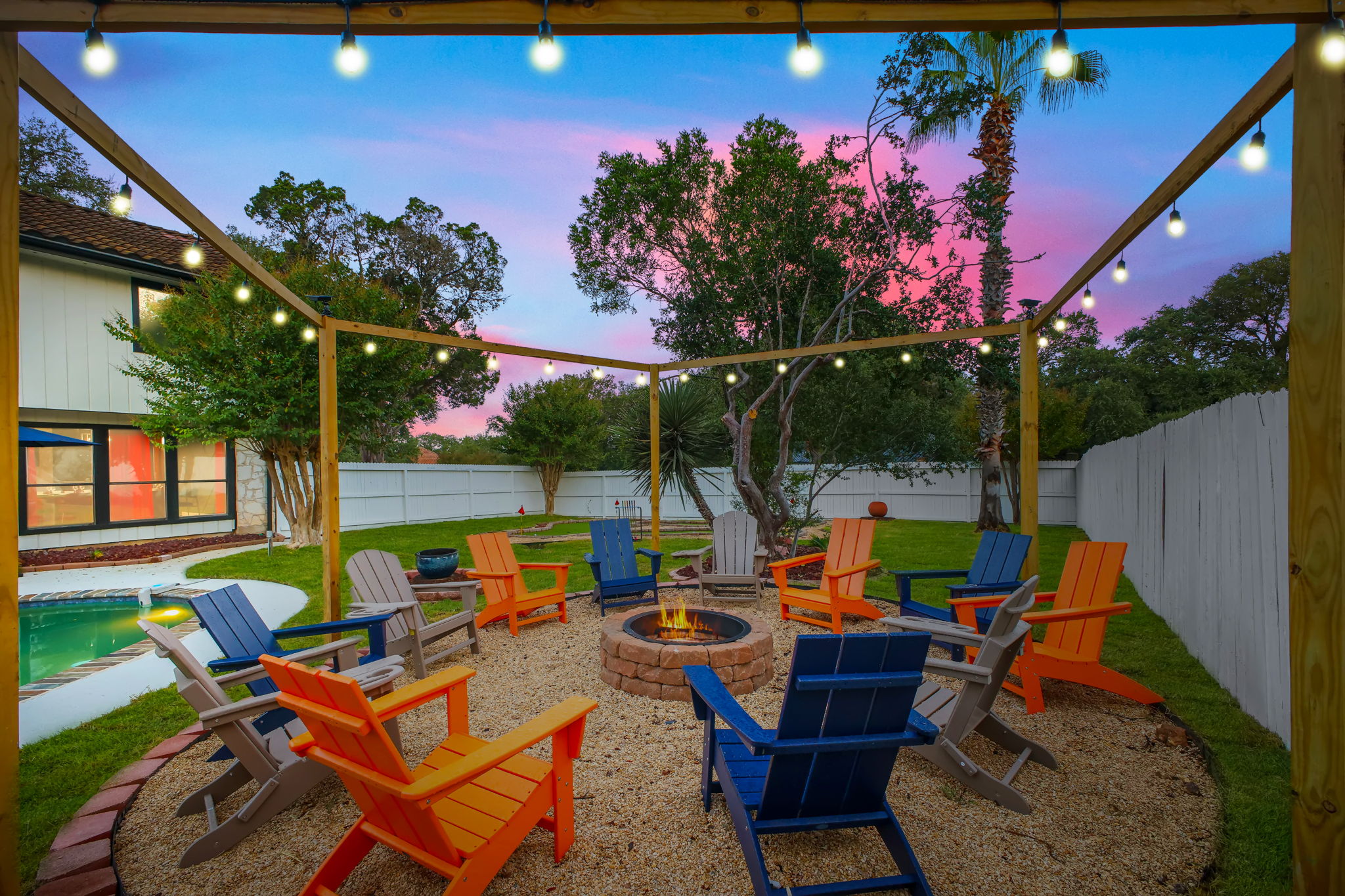 Cozy fire pit setting creates the ultimate evening hangout spot.