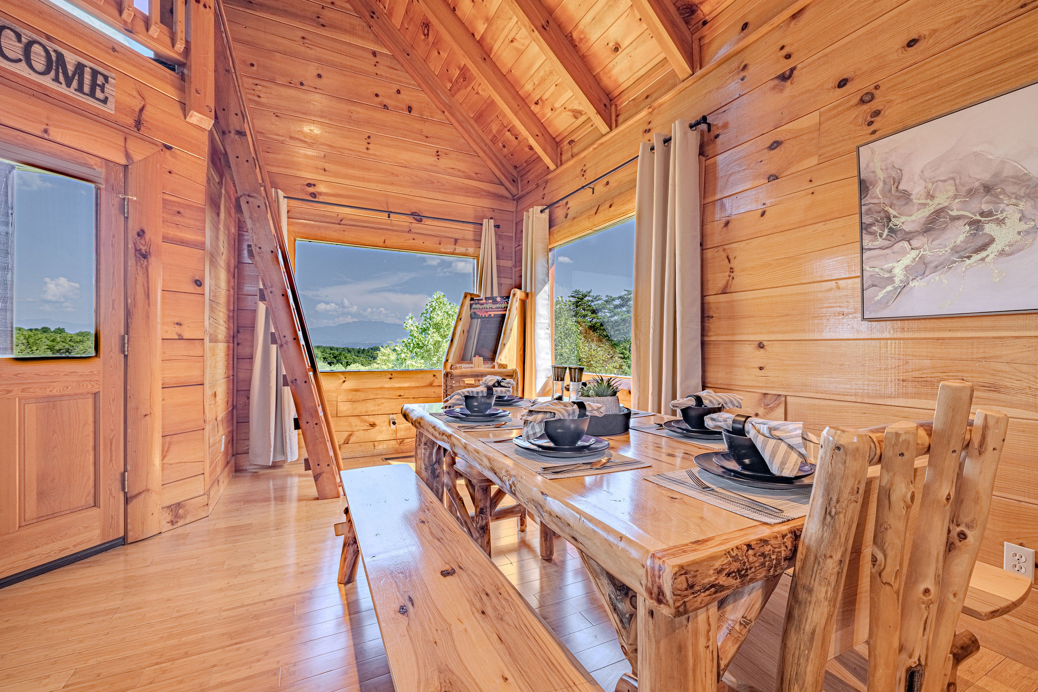 From the dining table, it's just a hop, skip, and a ladder climb to the kids' loft or steps to the arcade, promising endless entertainment for younger guests.