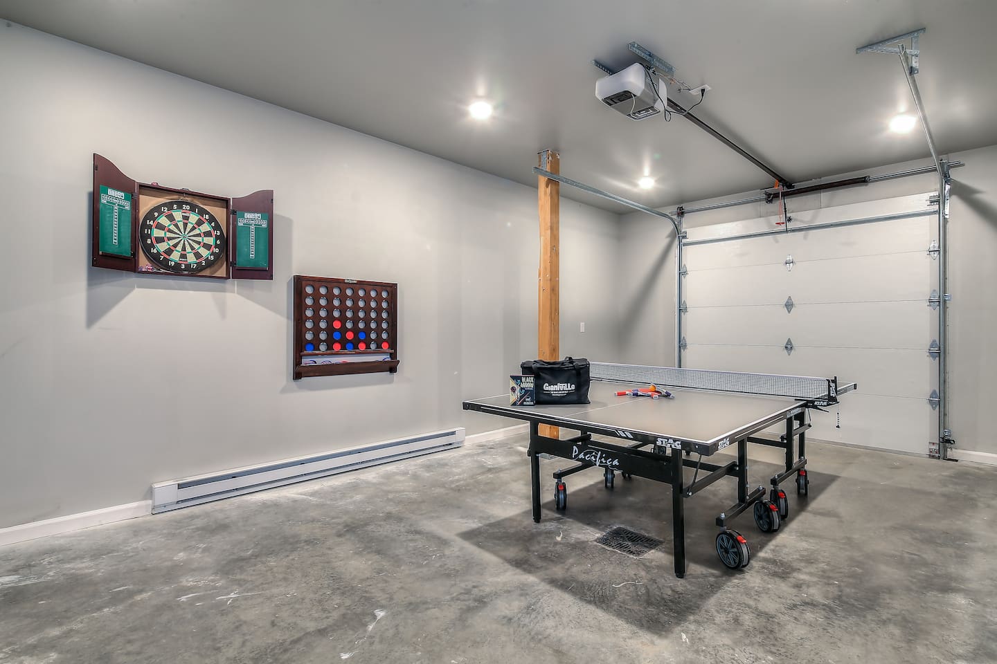 Full-sized Ping Pong table, Darts, Connect Four, Giant Jenga, Elliptical machine, and a Newly Added Arcade Console!