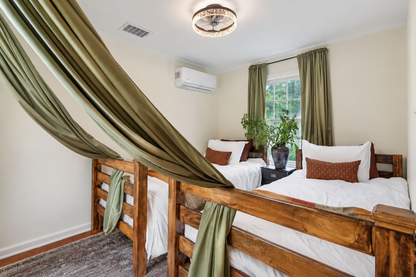 Bedroom 4 offers two single beds, making it a comfortable setup for friends, siblings, or additional guests.