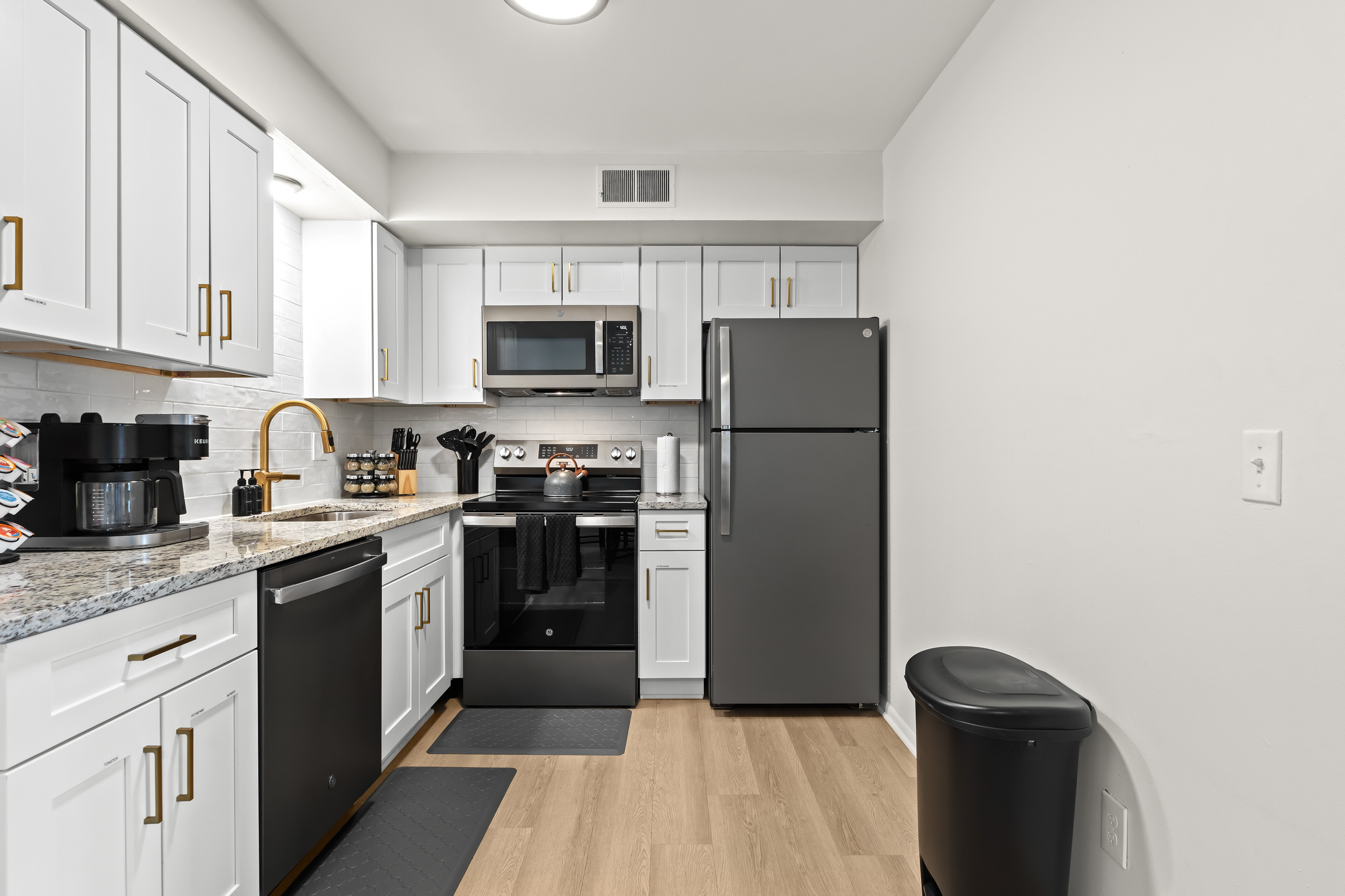 Fully equipped kitchen featuring full-size appliances and everything needed for home-cooked meals.