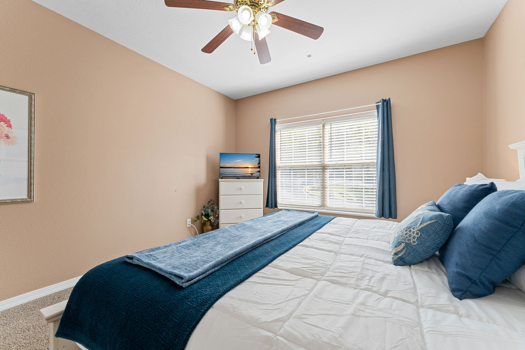 The second bedroom is right off of the kitchen and dining area