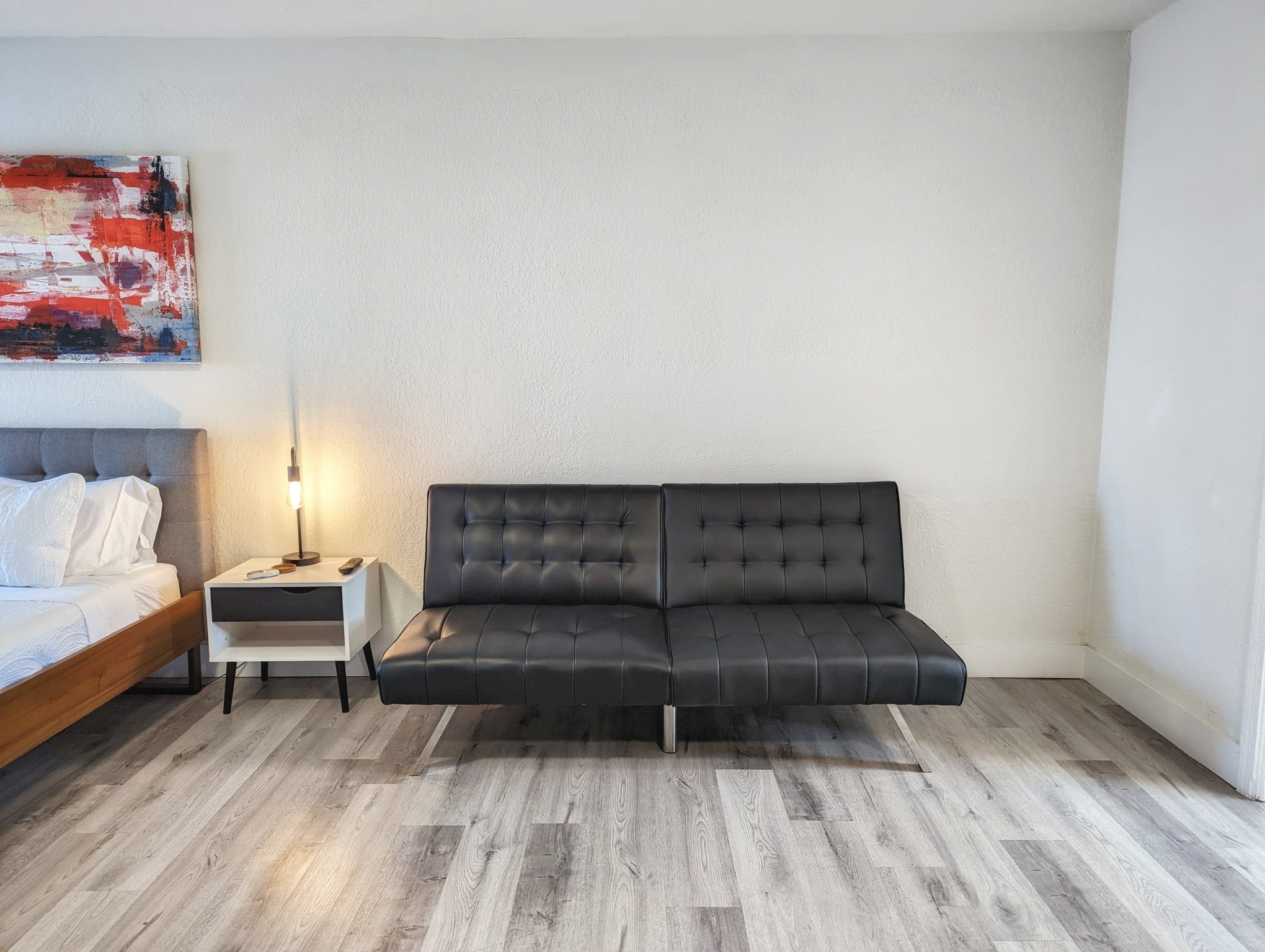 Futon converts to a twin bed for 3rd guest or by request for a $50 setup fee.