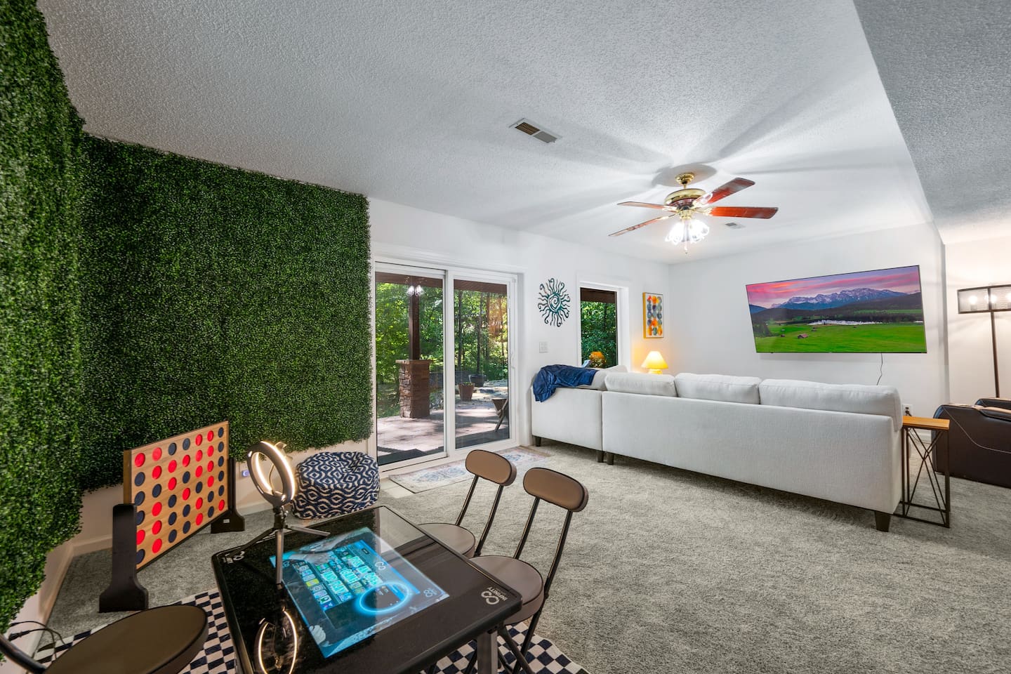 2nd living room located downstairs Infinity Game TableFlat Screen TvPlush Sectional 