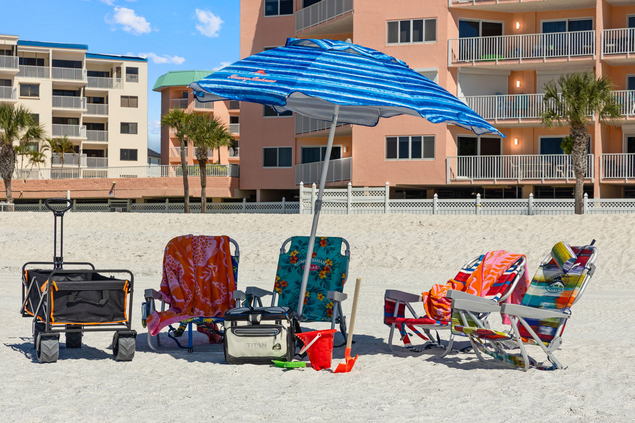We provide 4 beach chairs, umbrella, and cooler.