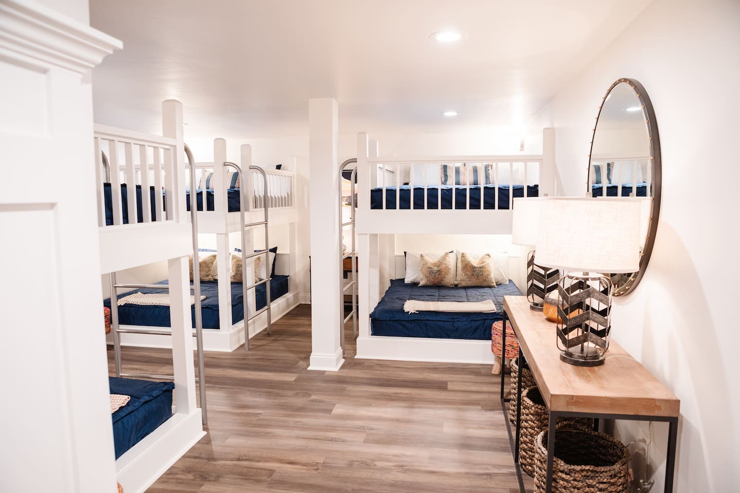 One of two bunk rooms.  Each bunk room has 6 queen size beds.  There is a bunk bathroom for each bunk room with 3 showers and 3 toilets each.
