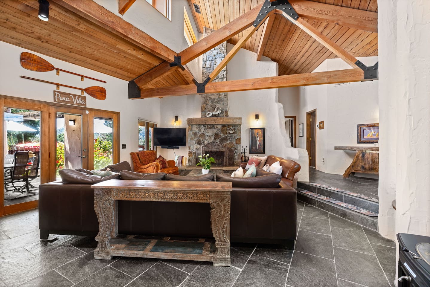 Sink in and stay awhile.  Comfortable seating for movie nights, games, and late-night chats.  Every corner designed with relaxation in mind. Gorgeous wood burning fireplace to enjoy. 