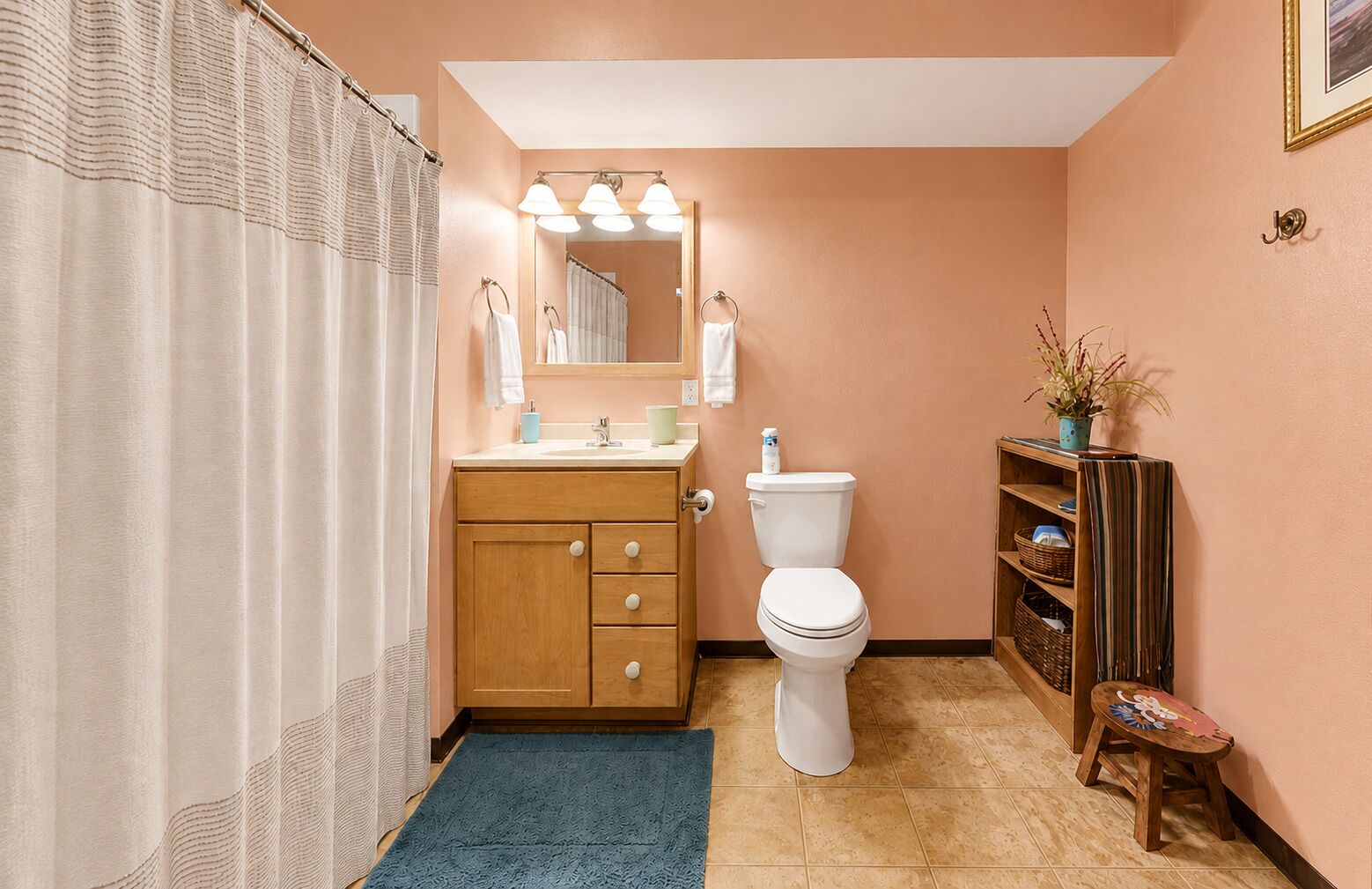 A comfortable and convenient full bathroom serving the main living areas of the home.