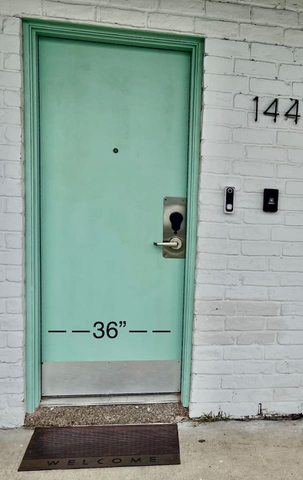 Entrance with a 36-inch door opening and covered access to Unit 144.
