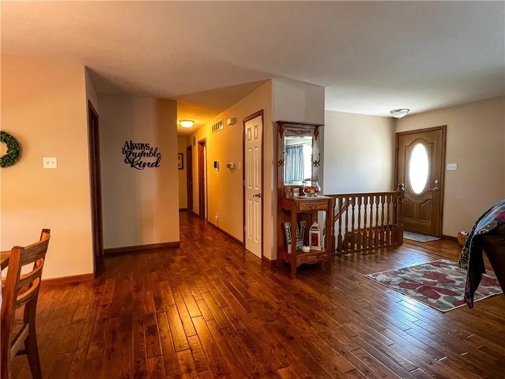 This welcoming entryway offers a calm beginning to your stay, setting the stage for quiet moments and comfortable living.