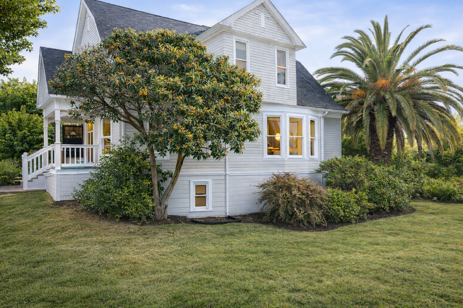 Beautifully landscaped and full of character. The exterior features unique architectural details and a spacious lawn, tucked away behind a private gated entrance.