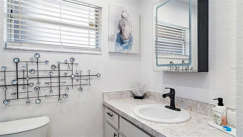 Both bathrooms are stocked with toiletries and other travel essentials.