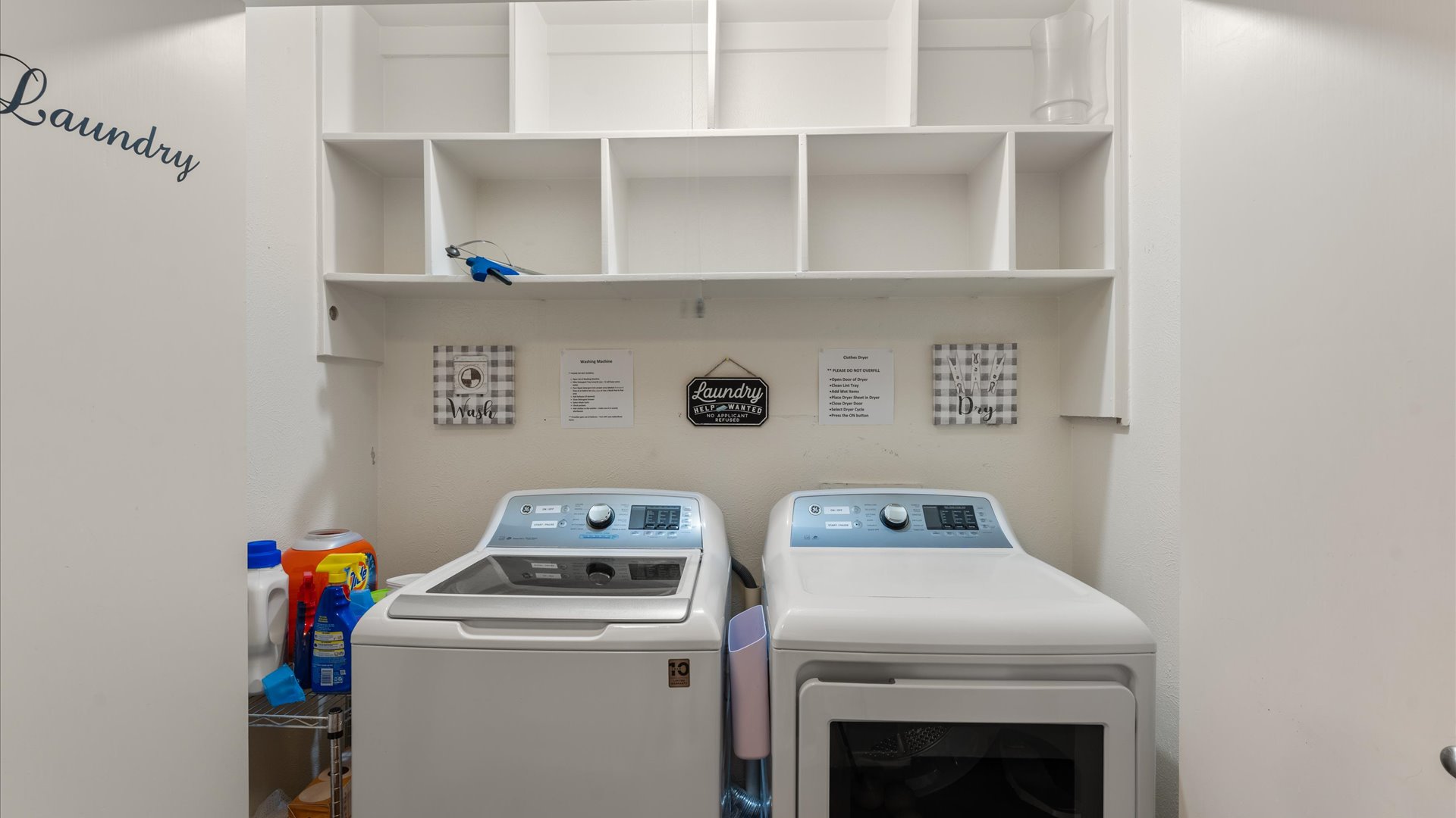 The laundry area has a full-size washer and dryer with wool balls. Tide pods, stain remover, and a laundry basket are provided for convenient laundry care during your stay.