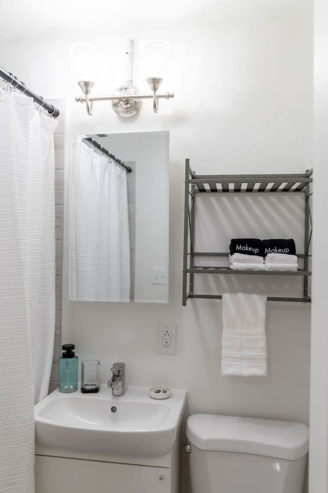 Modern full bathroom with sleek fixtures and plenty of space for a refreshing and relaxing experience.