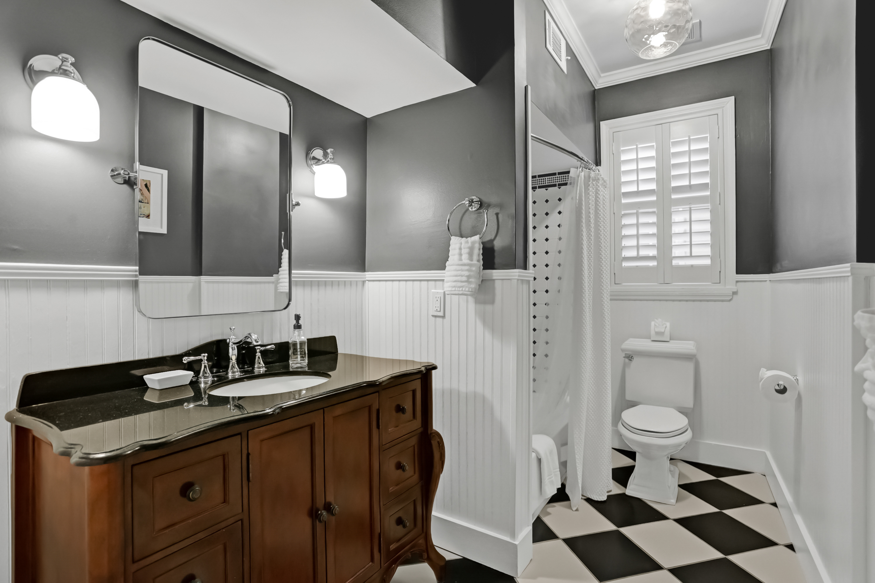 Clean and bright bathroom with fresh towels and essentials.