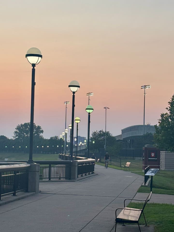 Streetlamps at dusk along White River Trail  - perfect for peaceful evening walks in the heart of Indy