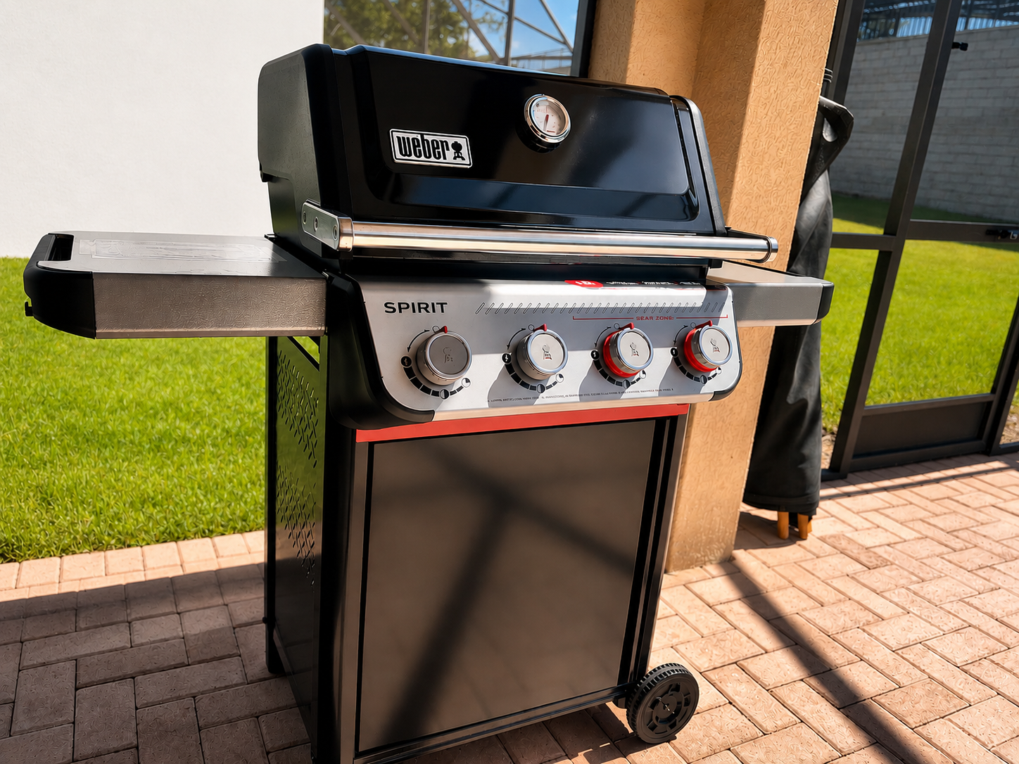 Included 4 burner Weber Grill!