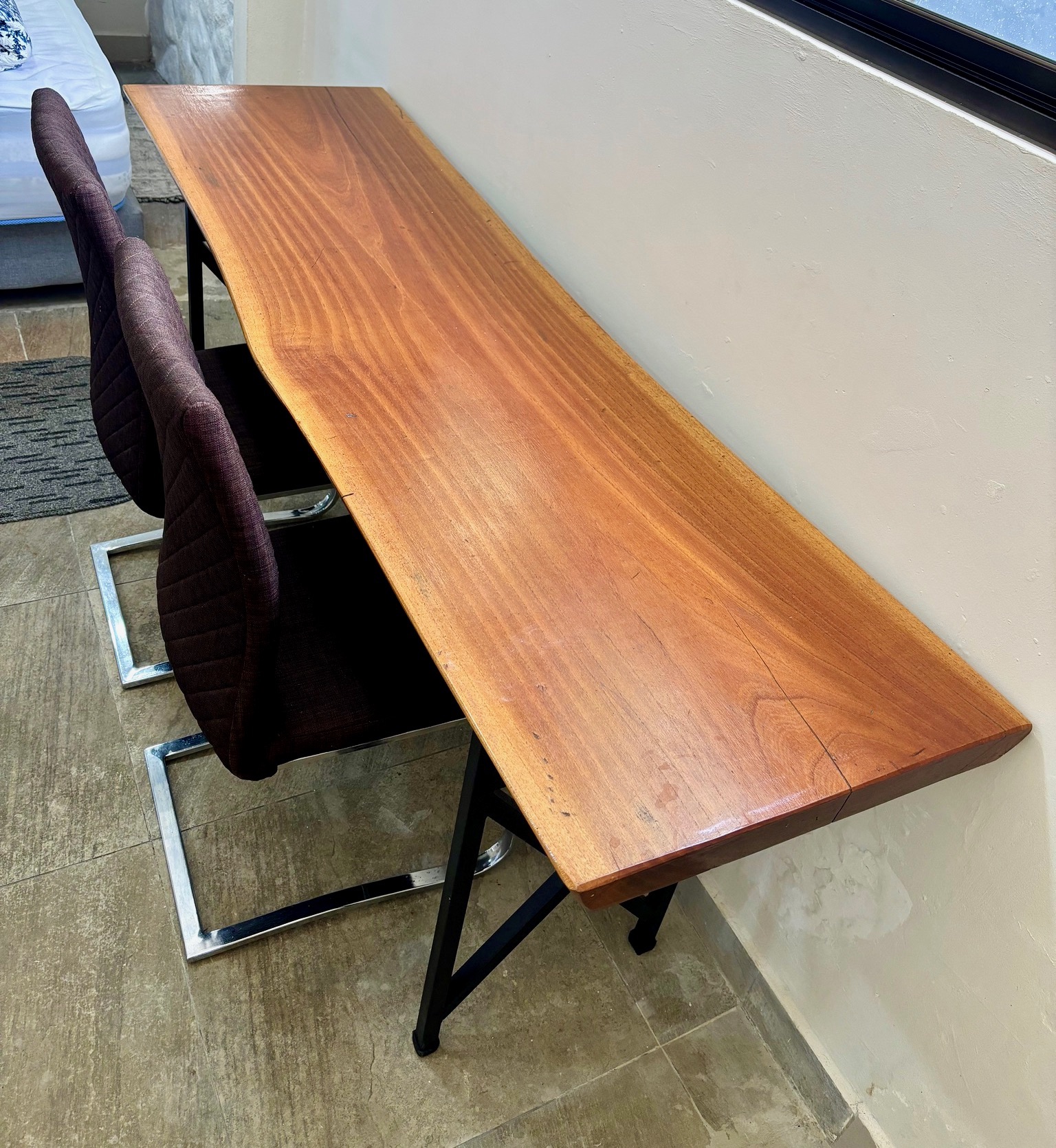 A sturdy desk is available for remote working or hosting dinners outside