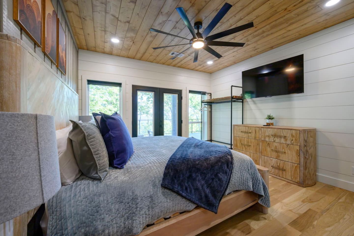Spacious king bedroom designed for comfort, privacy, and relaxation.