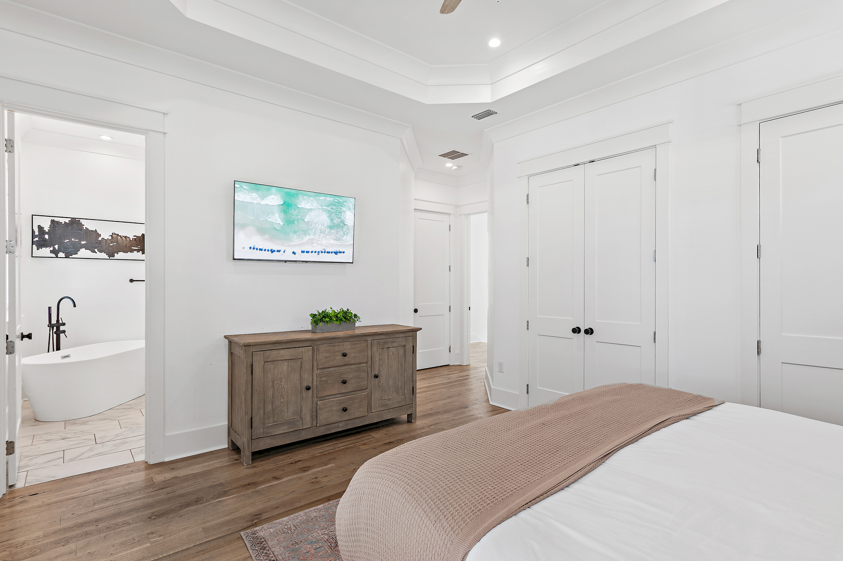 A beautifully styled king bedroom offering comfort and a peaceful place to recharge.