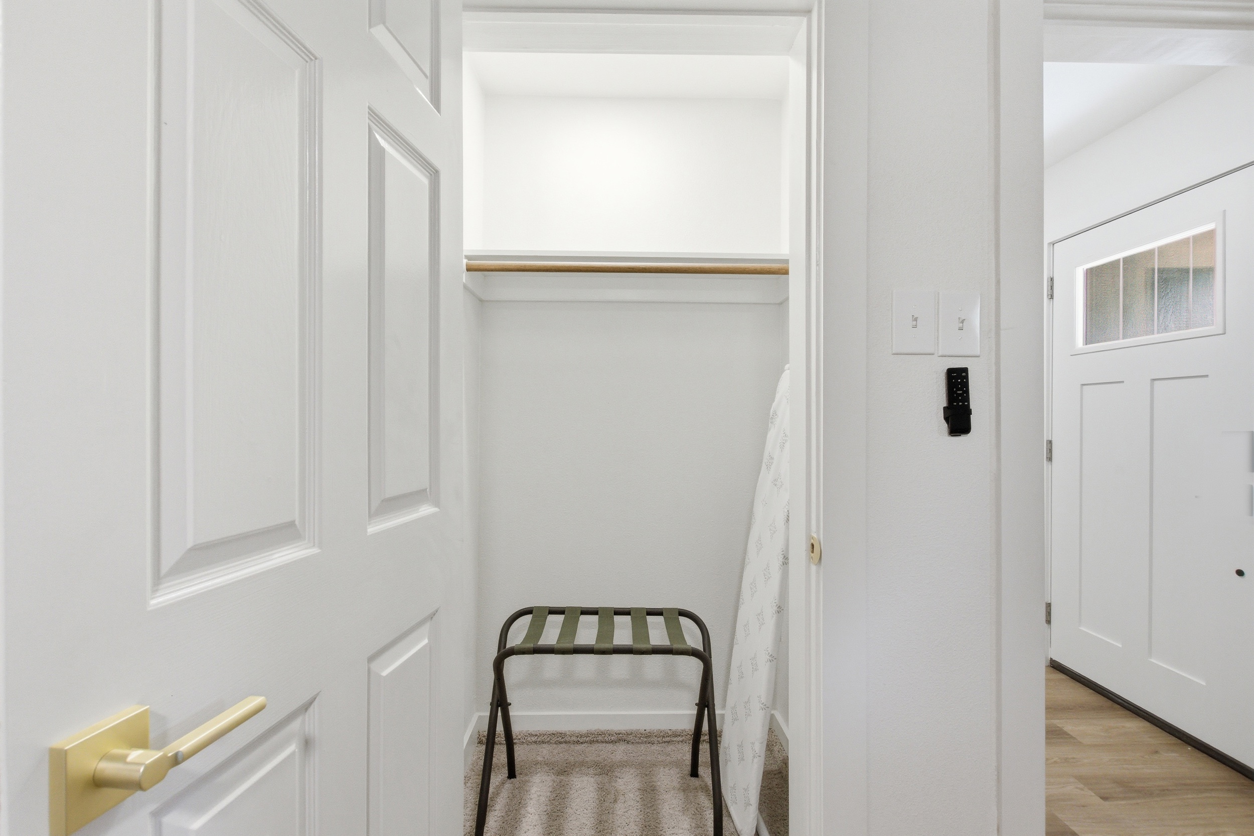 Closet, hangers, and chest of drawers in Bedroom 3. Lock on bedroom door. Portable Fan available. Ideal for extended stays near AT&T Stadium, Arlington entertainment district.