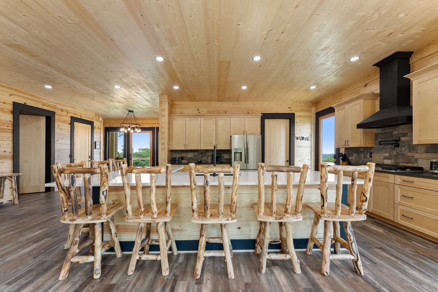 Handcrafted wood seating and seamless design make this dining area a warm, inviting hub for guests to connect over food and conversation.