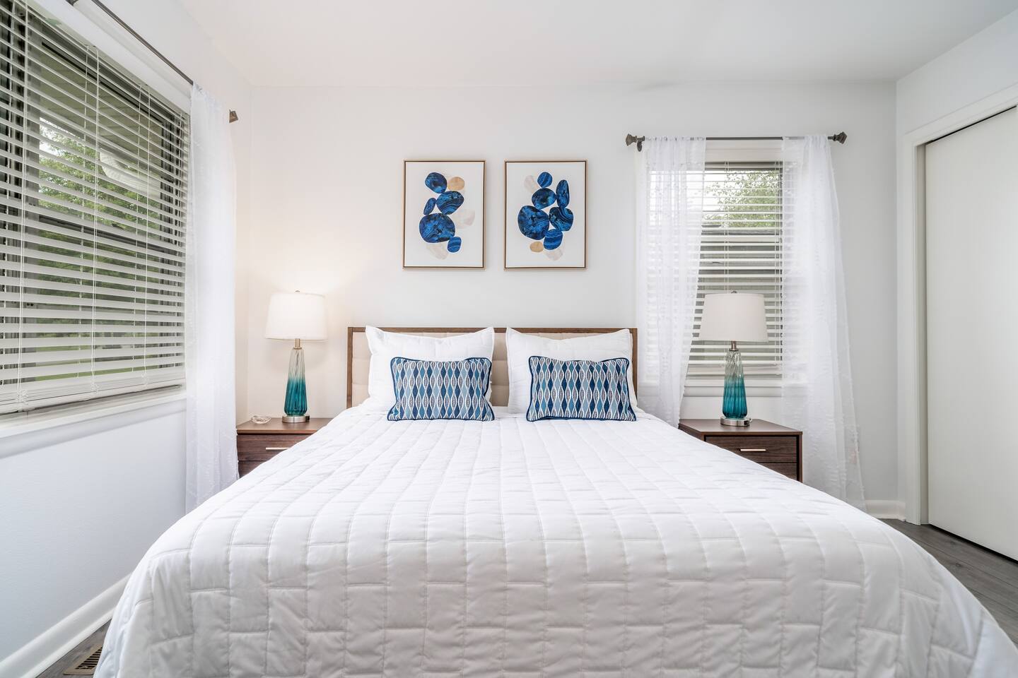 Queen Bedroom with Luxury linens, touch lamps, desk and chair