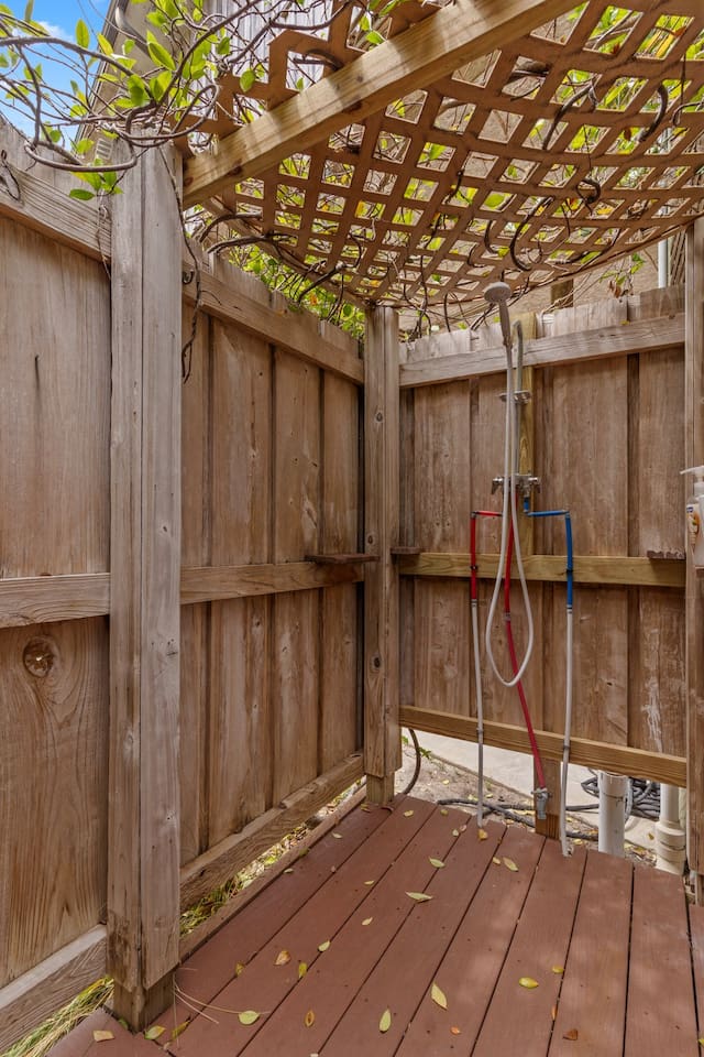 Outdoor shower with hot/cold water shampoo, conditioner and body wash 