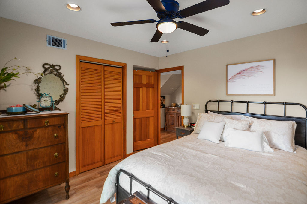 Queen Bedroom with Walkout to Amazing Lake Views