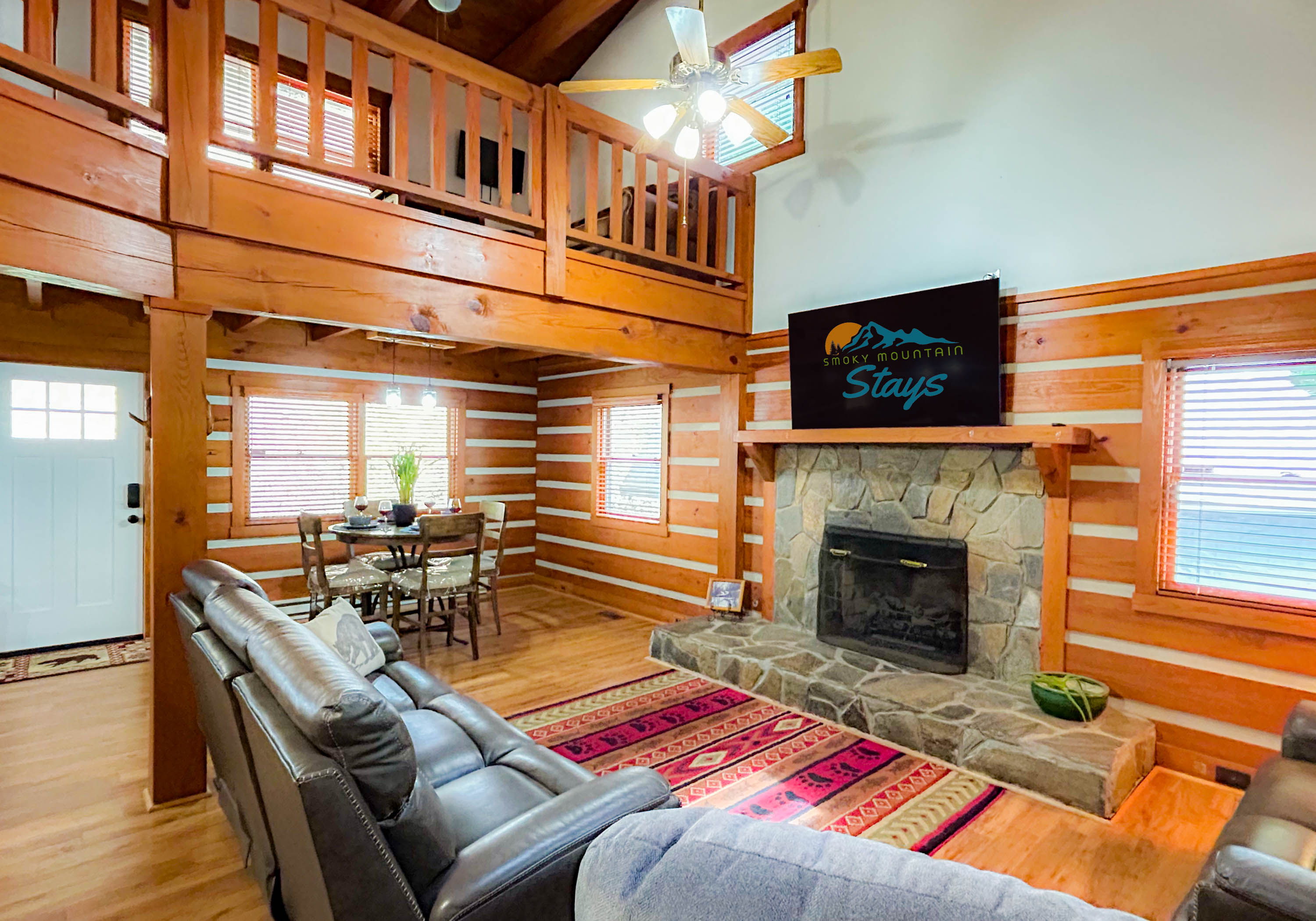 living room area complete with a 70" SmartTV