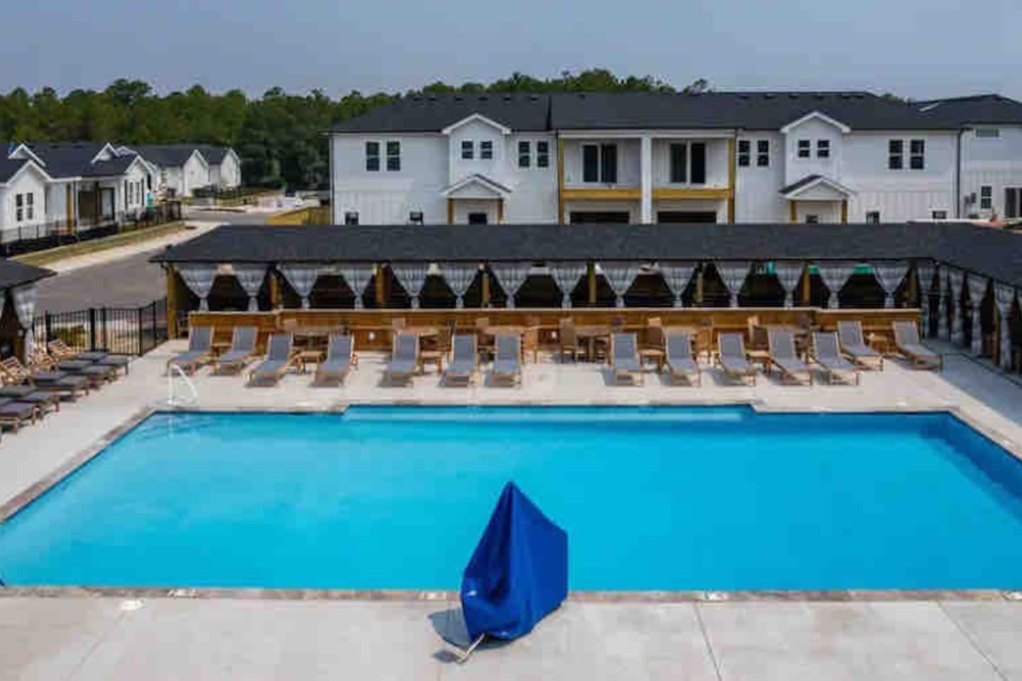 Enjoy a day by the sparkling swimming pool or cool off in the private cabanas.