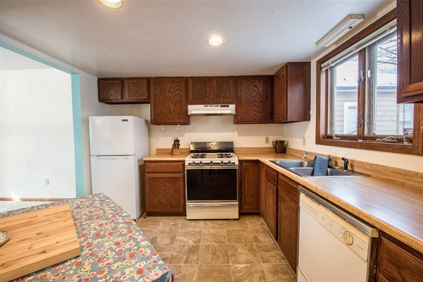 Fully stocked kitchen in common space.