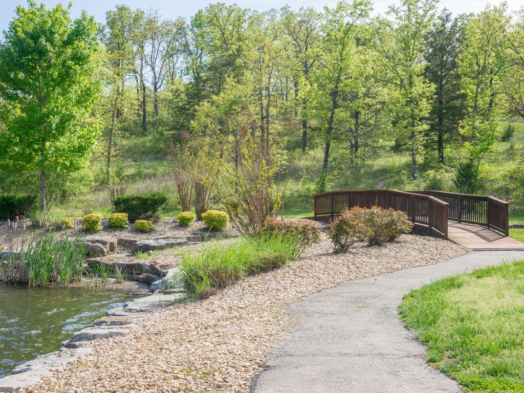 Beautiful walking paths around Fox Hollow Lake, a short walk away..