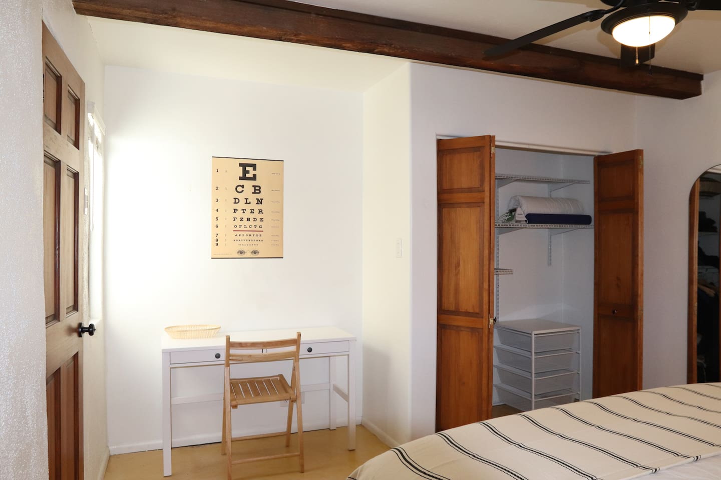 Master bedroom, small desk, closet space