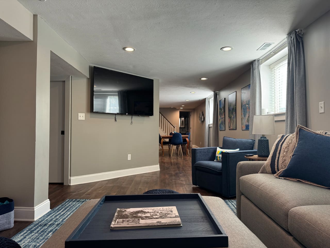 Enjoy a movie night with plenty of comfortable seating and a 65" Roku smart TV.