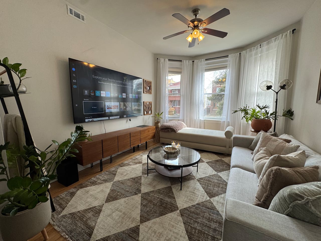 Large living room with smart TV and plenty of space to relax.